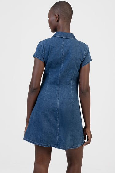 back view of a blue denim dress with short sleeves on a model