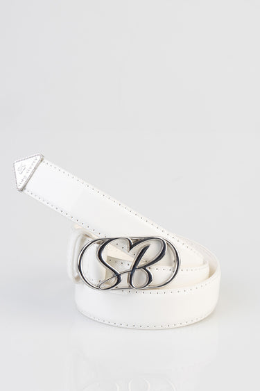 white patent belt with a large silver intertwined buckle on a white background
