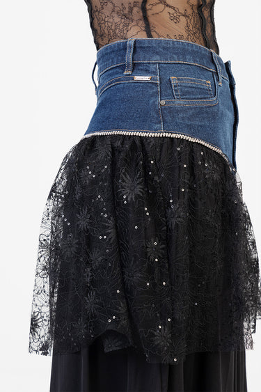 blue denim midi skirt with sheer black lace overlay and silver sequins along the hem