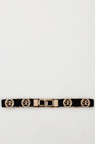 black belt with gold metal hardware and circular rhinestone medallions featuring sb initials