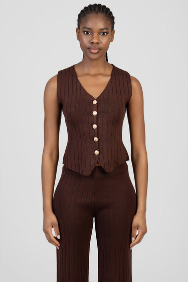 woman model in brown ribbed knit waistcoat with gold buttons and matching knit pants by Blue Jean Traders
