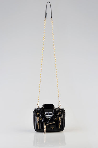 small black patent leather bag with a gold chain shoulder strap and front zippers with a logo patch