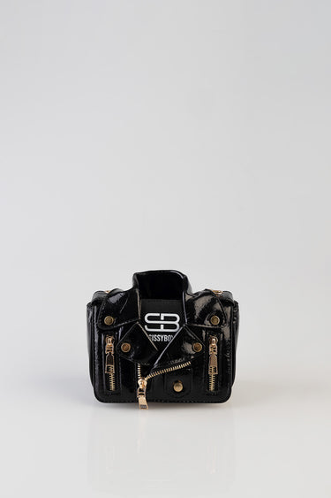 small black patent leather mini bag with gold zippers and metal hardware, front logo patch reading CB Sissyboy