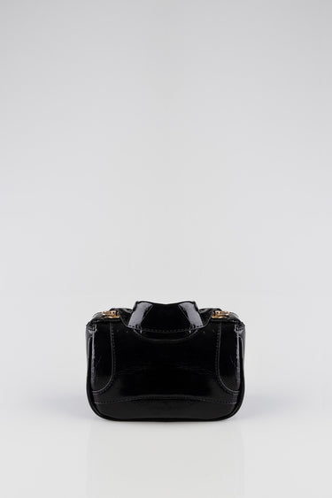 Blue Jean Traders black patent leather mini bag with gold hardware and top handle