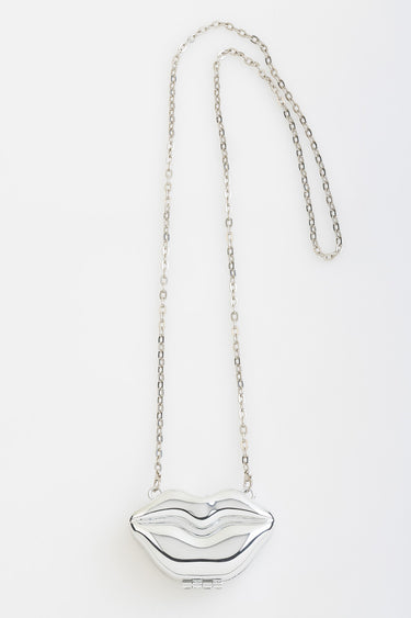 silver lips bag pendant on a thin silver chain