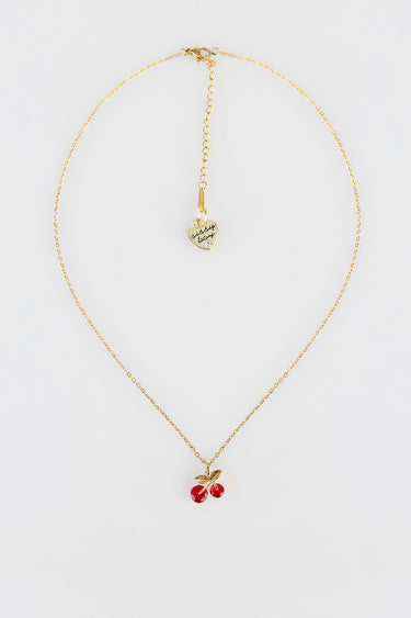 gold tone chain necklace with a red cherry pendant and a small heart charm