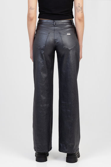 back view of a person wearing blue jean traders wide leg pants in metallic dark wash with two back pockets and a small