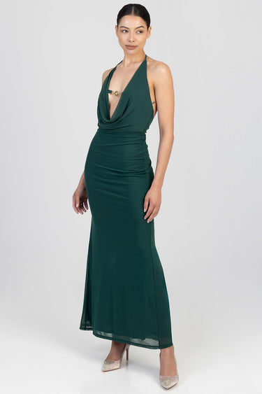 model in emerald green maxi dress with halter neckline and draped bodice, fitted waist and long skirt