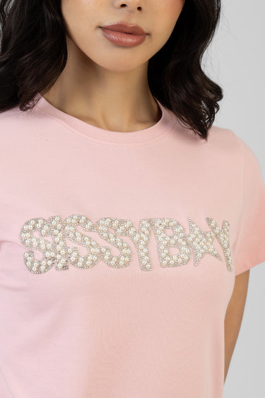 pink crew neck short sleeve tee with sparkling rhinestone letters across the chest