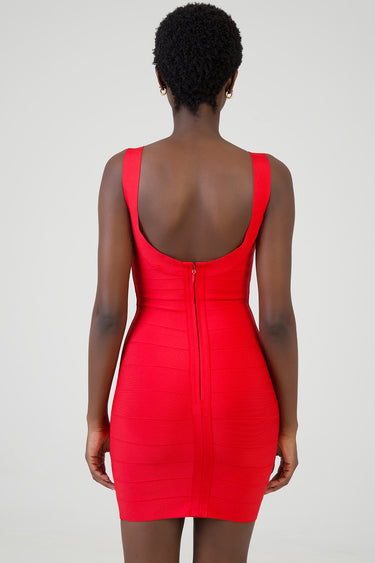 back view of a bright red sleeveless bodycon dress with a center back zipper and horizontal seams