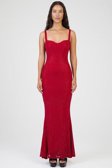 red maxi dress with allover cutout detailing and a fitted bodice with straps, full length on model