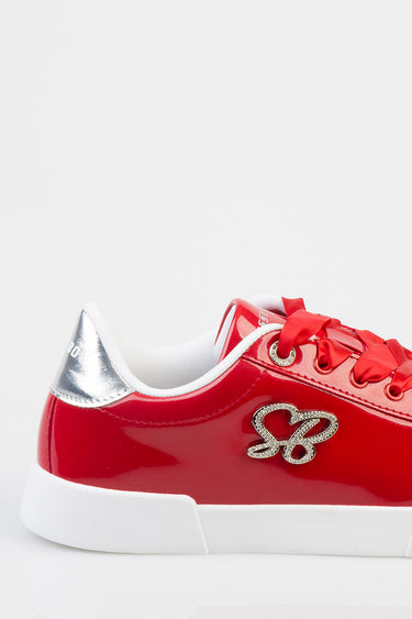 red patent sneakers by blue jean traders with white sole, silver heel tab, red satin laces and rhinestone logo on side