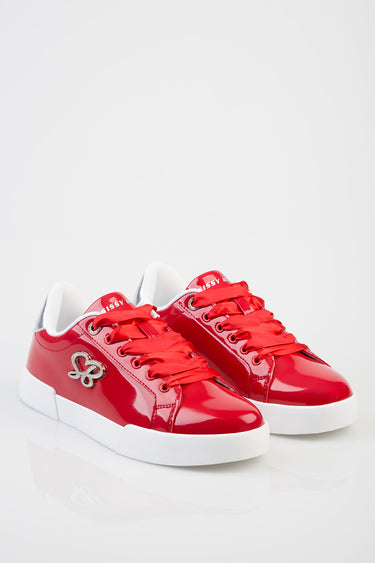 red patent sneakers with white sole and laces, side emblem, by Blue Jean Traders