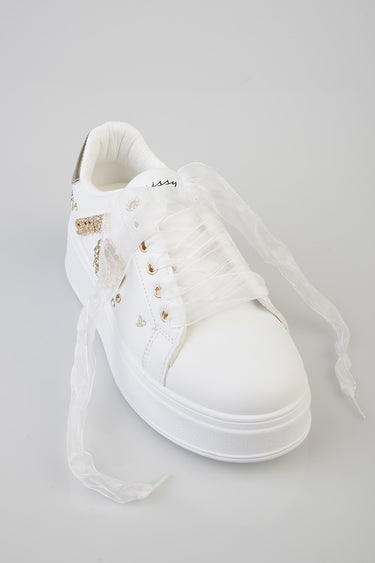 white platform sneaker with sheer ribbon laces, gold stud accents and metallic heel panel