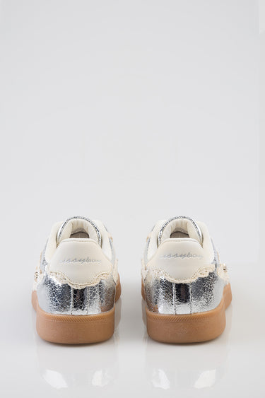 back view of silver and ivory sneakers with a gum sole by blue jean traders