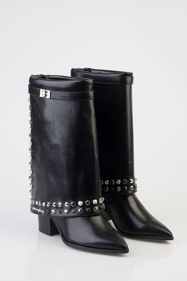 black leather mid calf boots with silver stud embellishments along the cuff and a small buckle strap