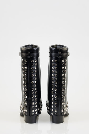 black knee high boots with silver studs along the shafts and a top strap, back view