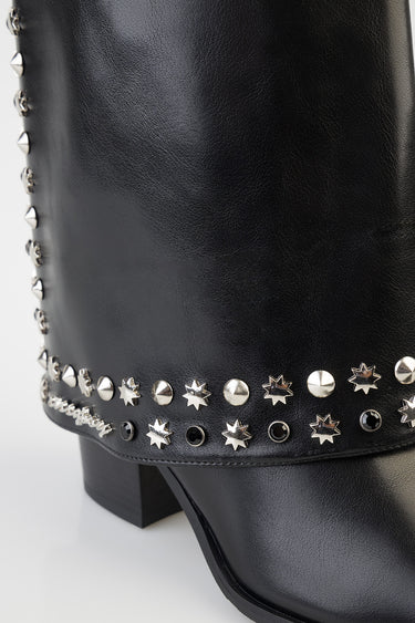 black leather boot with silver star and round studs around the ankle and toe
