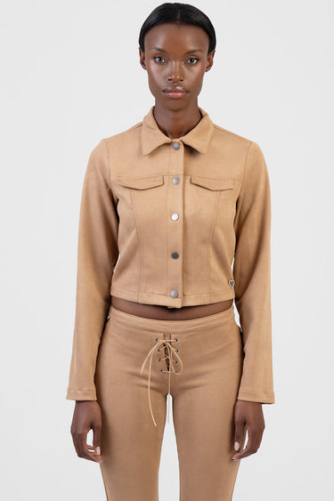 model wears a tan faux suede cropped jacket with silver buttons and two chest pockets