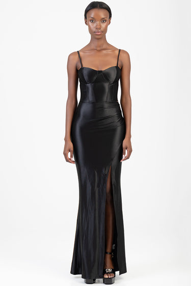 Blue Jean Traders black satin corset dress with thin straps, structured bodice and front slit on a model.
