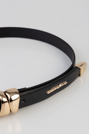 black leather belt with gold tone hardware and rounded end caps; close up of decorative gold studs