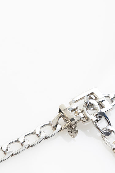 silver chain belt with chunky links, a rectangular toggle clasp, and a small heart charm by Blue Jean Traders