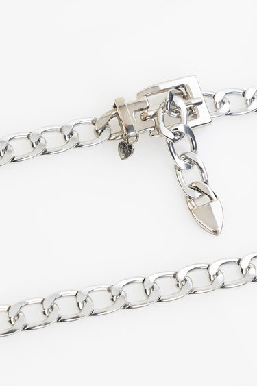 silver chain belt with a square clasp and a small heart charm
