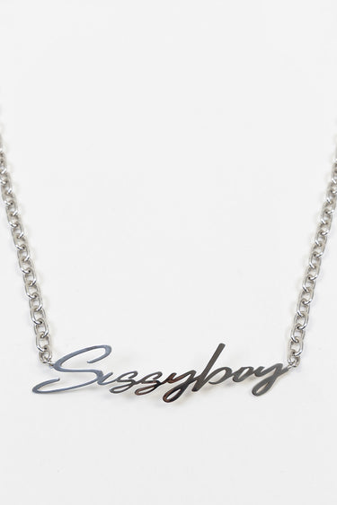 silver chain necklace with a flowing cursive word pendant on a white background