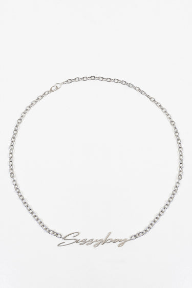 silver chain bracelet with a cursive word pendant
