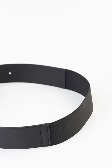 Blue Jean Traders belt with a wide black fabric center and leather ends close up