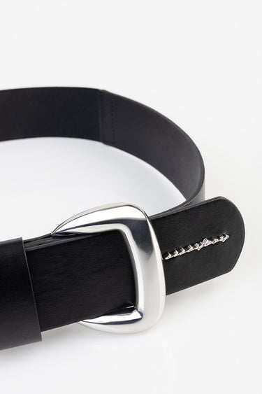 black leather belt with a large silver buckle and Blue Jean Traders lettering on the tip