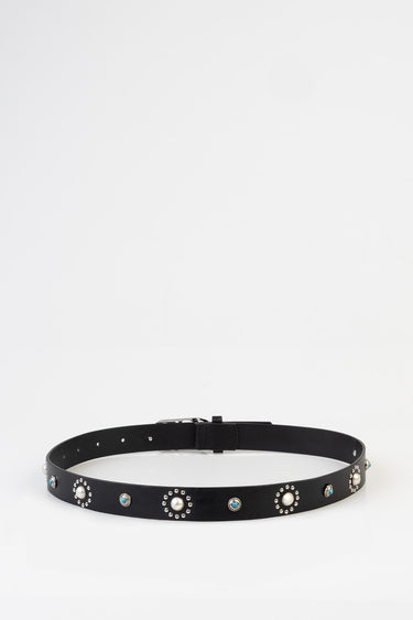 black leather belt with round silver studs pearl accents and turquoise stones laid flat