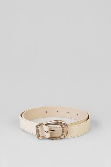 beige belt with a ridged rose gold buckle coiled on a light grey surface