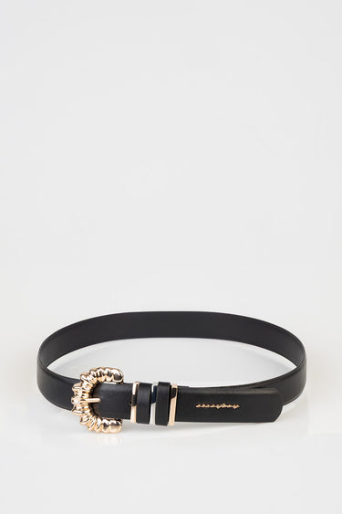 black leather belt with a gold circular buckle, stacked gold rings, and a small brand script on the strap