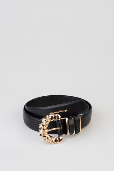 black leather belt with a large gold coiled ring buckle and metallic accents on a white background