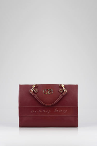 burgundy leather shopper bag with gold chain handles and embossed cursive lettering across the front