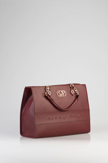 burgundy leather shopper bag with gold chain top handles and embossed logo on front