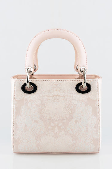 pink jacquard tote bag by blue jean traders with rounded handles and metal rings