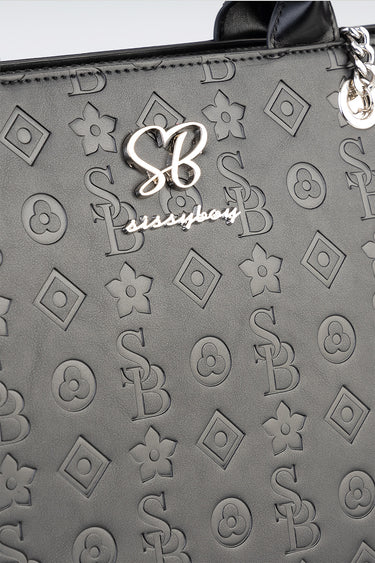 grey tote bag close up showing embossed geometric and floral pattern and a silver logo script