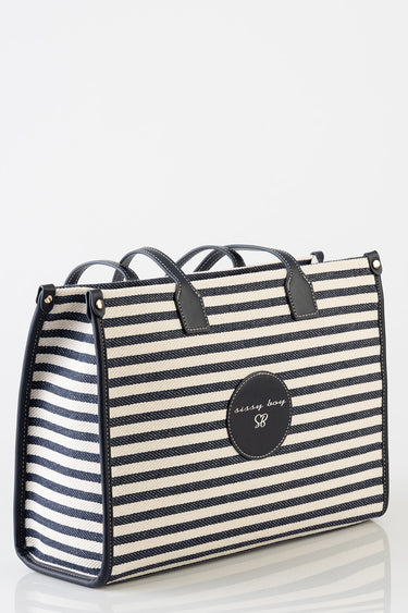 navy and cream striped tote bag with dark navy trim and two handles, circular logo patch with SB initials