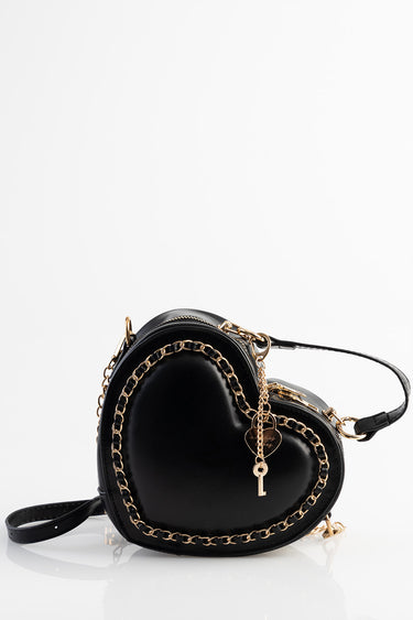 black heart shaped crossbody bag with gold chain strap and hanging key pendant