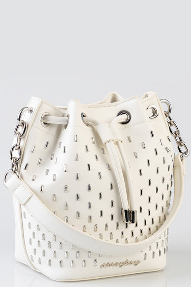 white bucket bag with silver rectangular studs, a drawstring top, and a silver chain strap