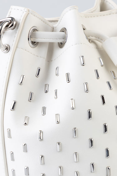 white leather bucket bag with silver square studs and metal eyelets