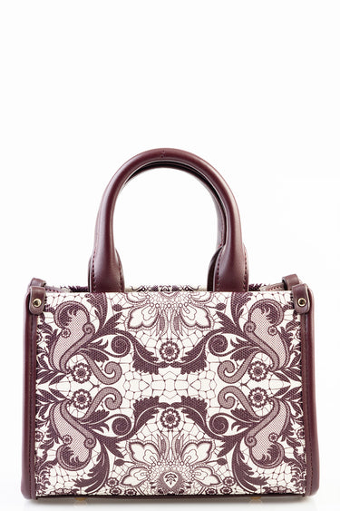 blue jean traders Joyce mini bag with burgundy leather trim and top handles, white lace pattern.
