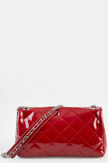 red patent leather handbag with quilted diamond pattern and silver chain strap