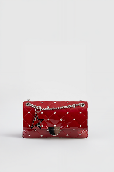 red quilted handbag with silver studs, chain strap, star charm by blue jean traders