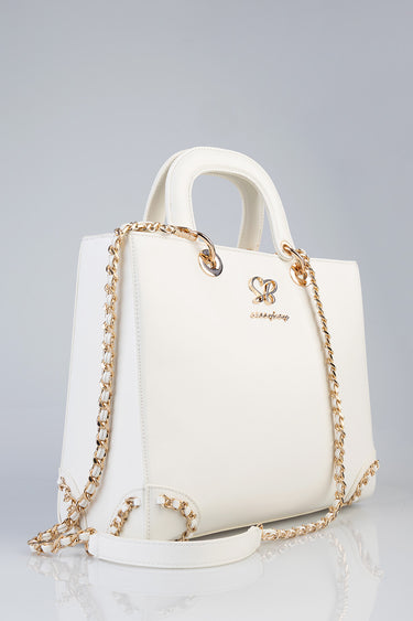 white leather handbag with rounded handles and gold chain straps, blue jean traders logo