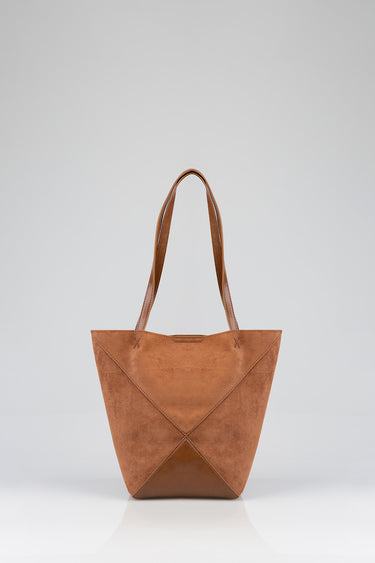 tan suede tote with two long straps and geometric panel stitching
