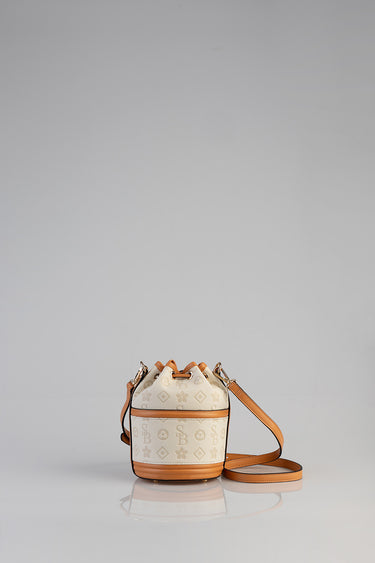 Blue Jean Traders mini debossed bucket bag in beige monogram canvas with tan leather trim and removable strap