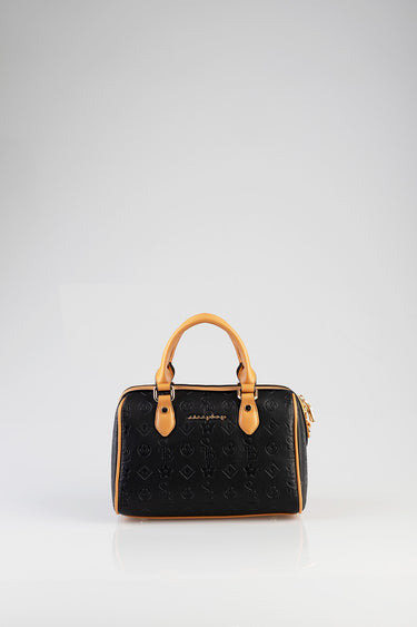 black bowler bag with tan handles and trim, embossed pattern, gold hardware, blue jean traders logo on light background